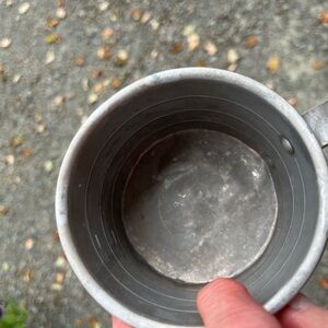 Aluminum measuring cup , capacity one cup , in good shape.